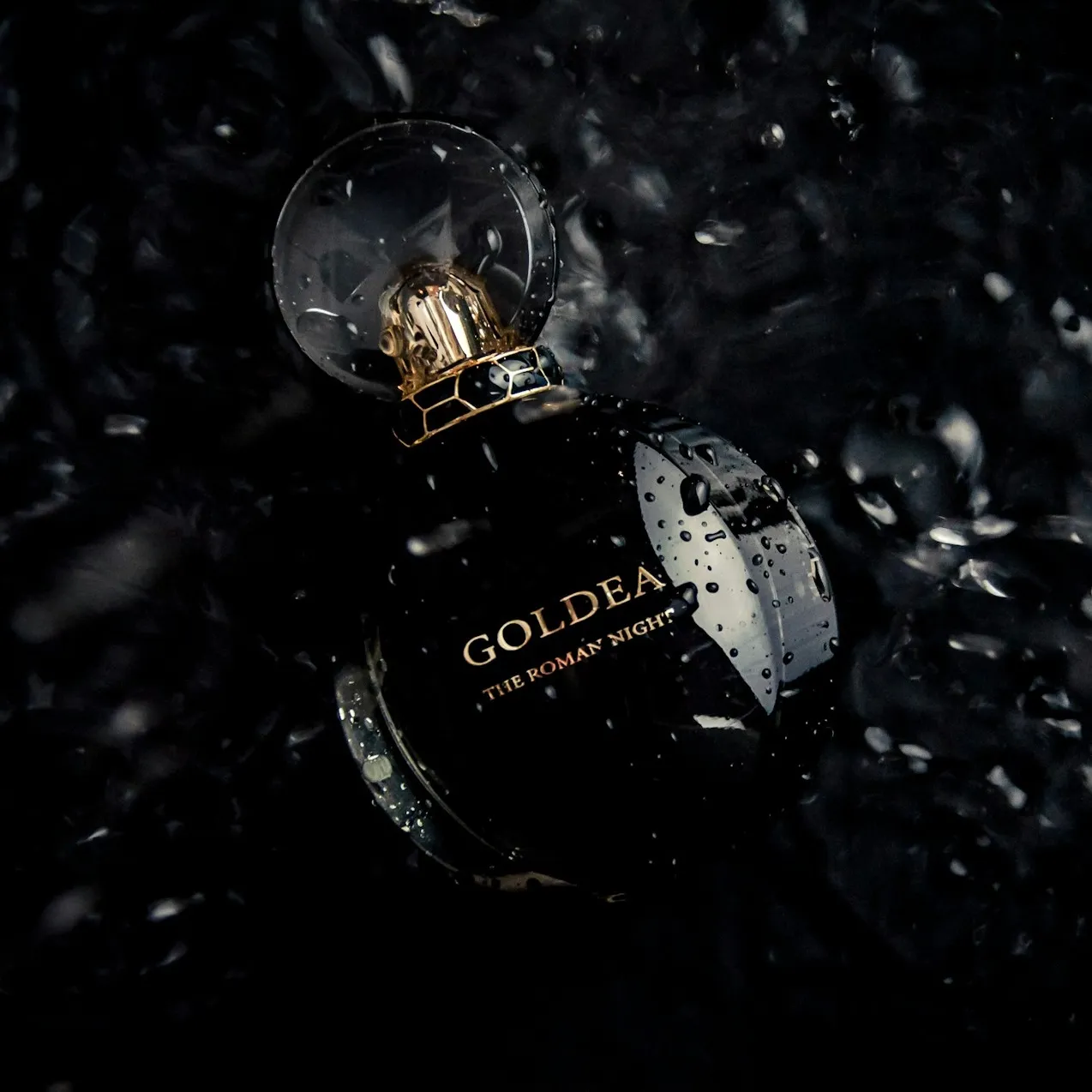Perfume Between Bubbles on Black Background